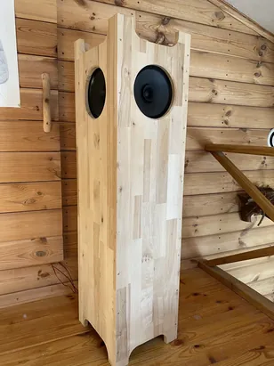 Single Speaker Stereo prototype cabinet in untreated laminated pine, with one front-facing and one side-facing full-range driver